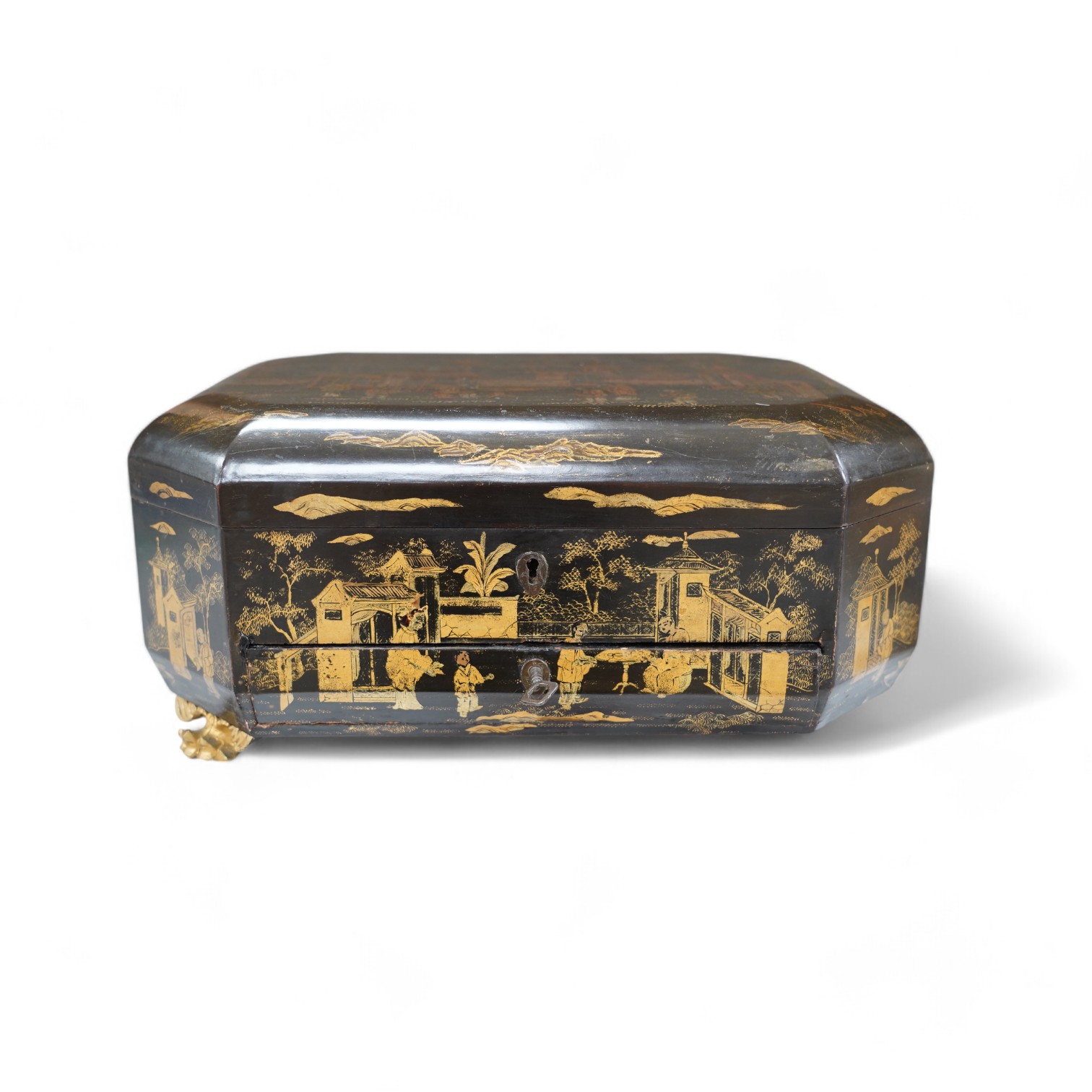 A Chinese black lacquer with gold decoration workbox, 36cm wide. Condition - one carved gilt paw foot missing to base